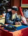The calligraphy expert at Temple of Literature Hanoi Vietnam