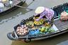 Vendors sell their goods from boats in the floating market Vietnam